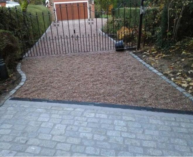 Gravel driveway with paved edgings